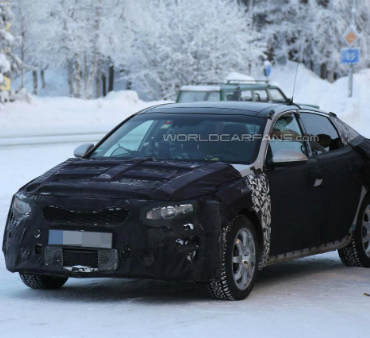 Замечена закамуфлированная Kia Optima